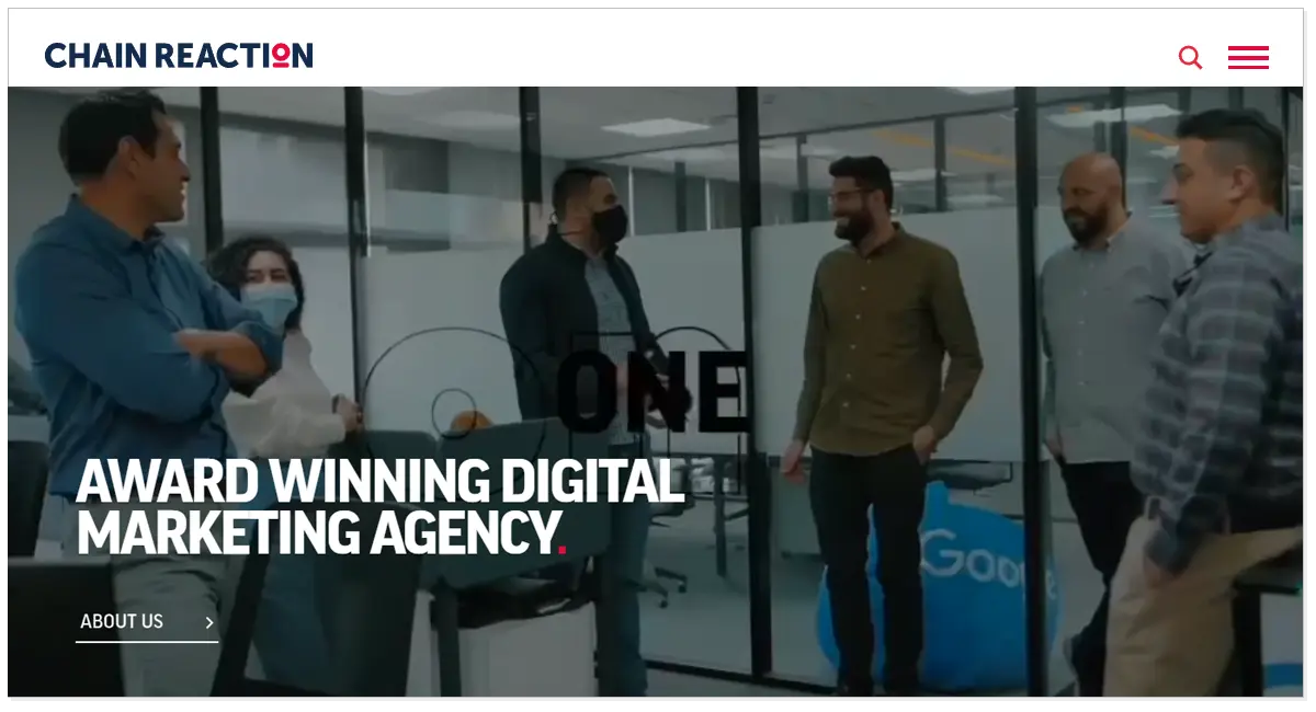 Chain Reaction home page with the picture of men and a lady talking with each other in the office.