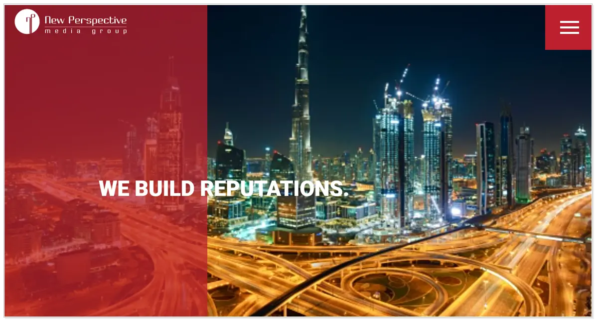 New Perspective Media Group home page with the picture of buildings and road of Dubai.