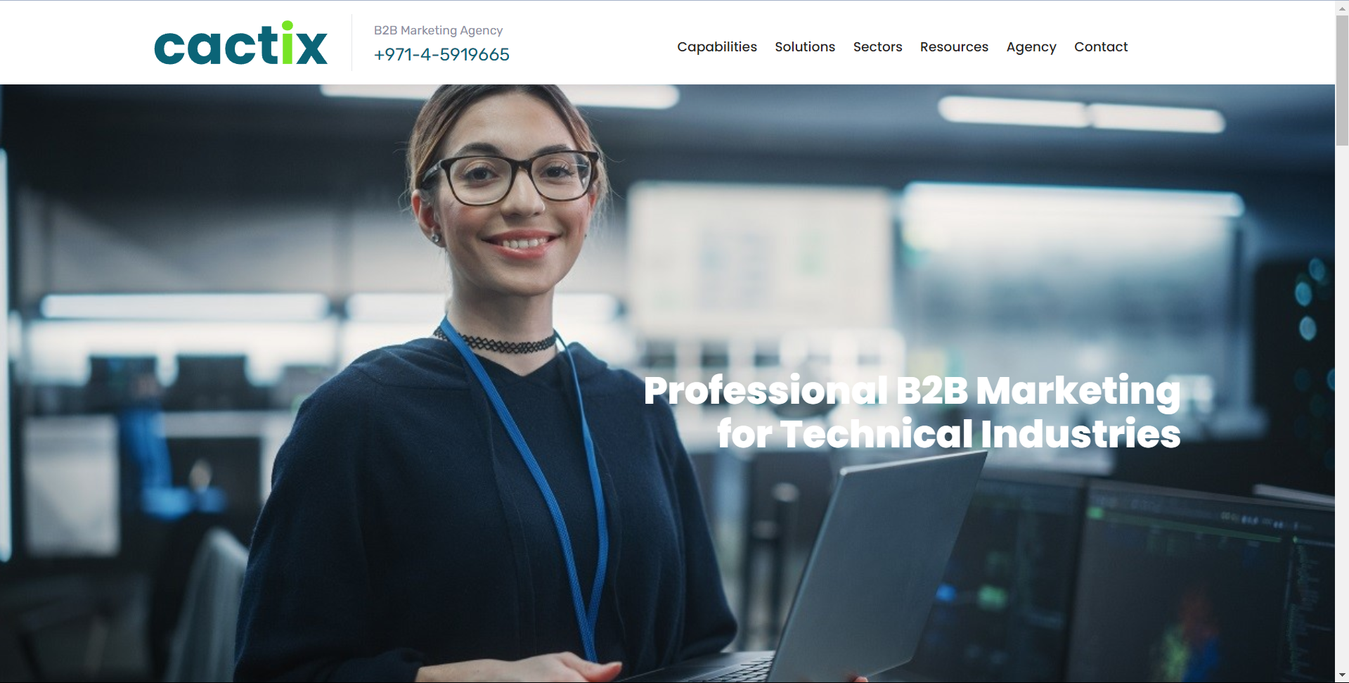 Cactix home page with a girl with smile on her face holding laptop in the office.