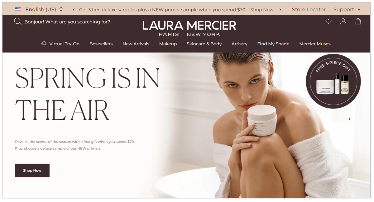 Home page of Laura Mercier with the girl holding Laura Mercier beauty product and free 3 pieces gift.