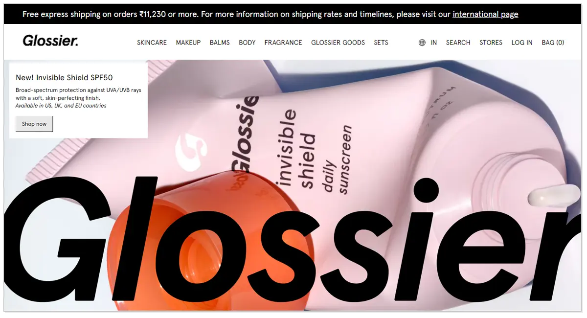 Home page of Glossier with a picture of daily sunscreen and a Shop Now button.
