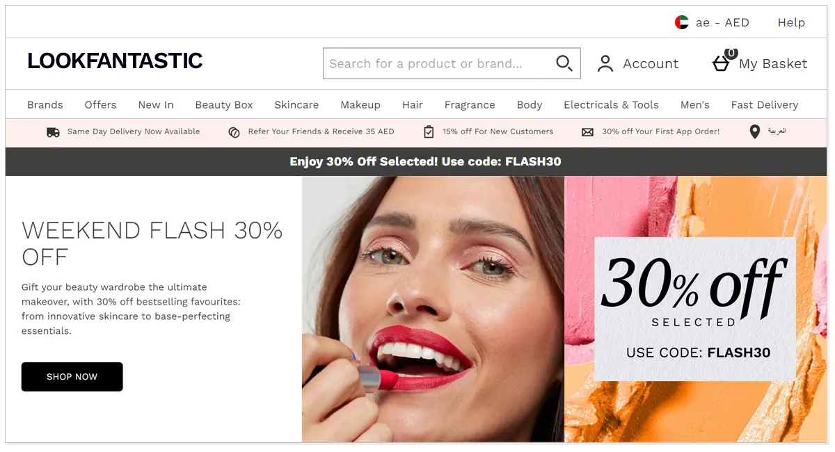 Home page of LookFantastic UAE with a search bar at to and picture of a lady with 30% off and Shop Now button.