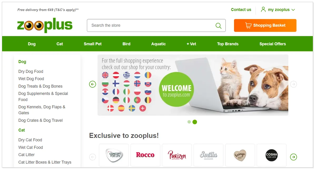 Zooplus UAEO home page with the picture of a dog and cat looking at the laptop screen with the flags of different nations.